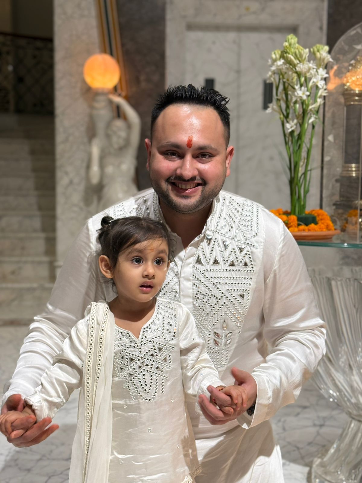 Graceful white mirror work kurta set