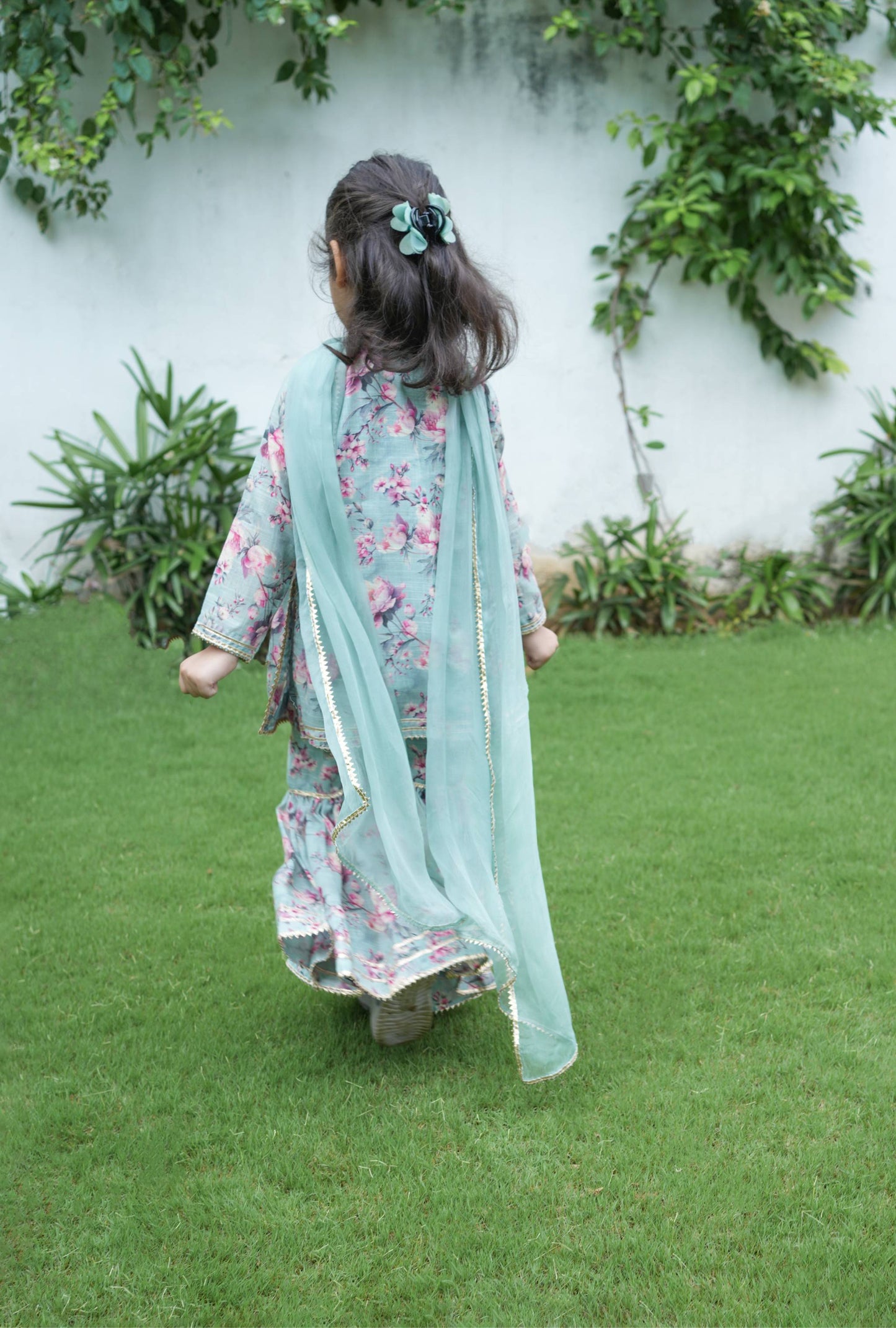 Beautiful floral linen cotton kurta adorned with beautiful gota laces alongwith a lovely flowy sharara set