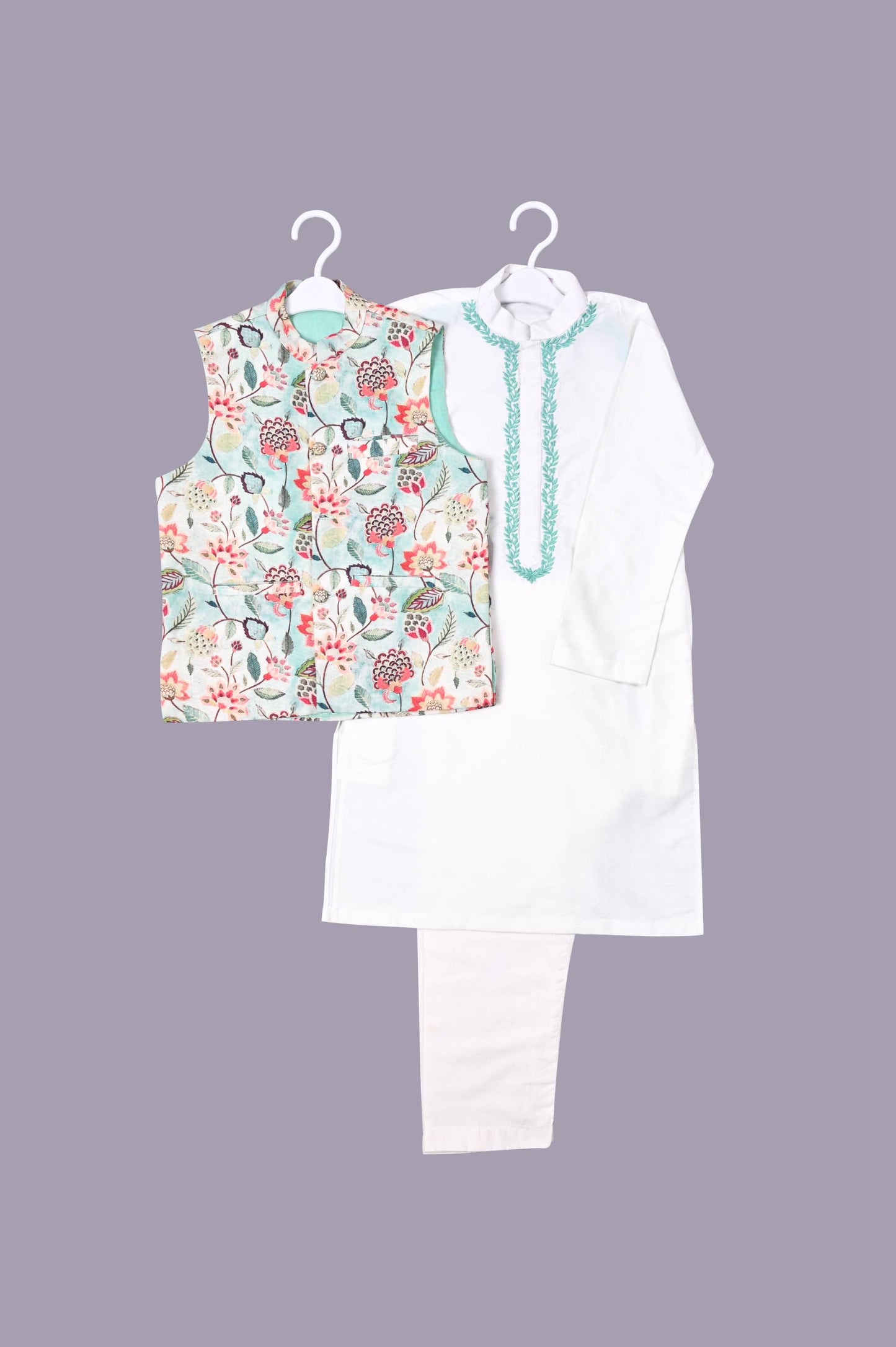 Royal white kurta with dori work and a gorgeous aqua floral jacket alongwith pants set