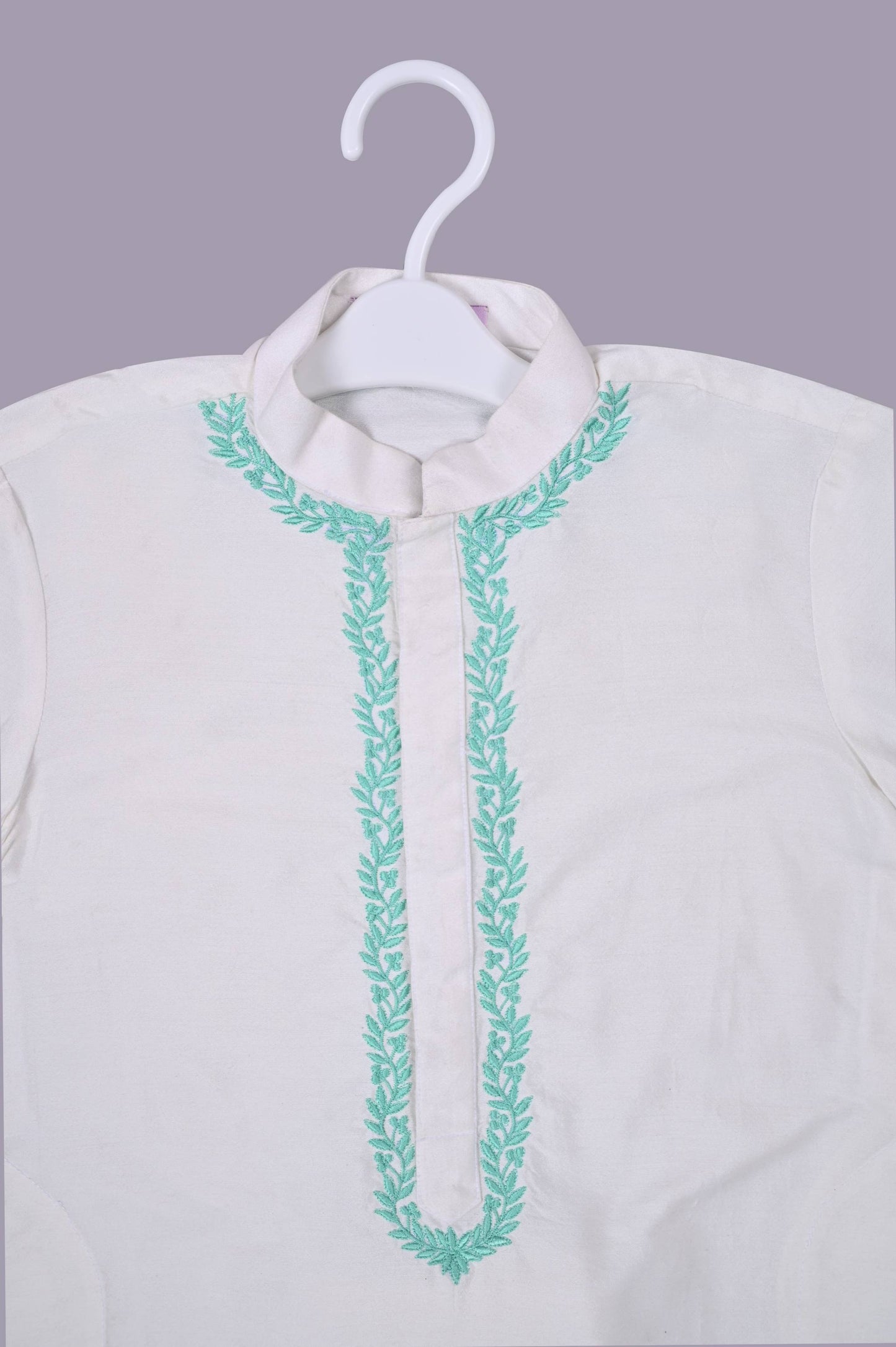 Royal white kurta with dori work and a gorgeous aqua floral jacket alongwith pants set