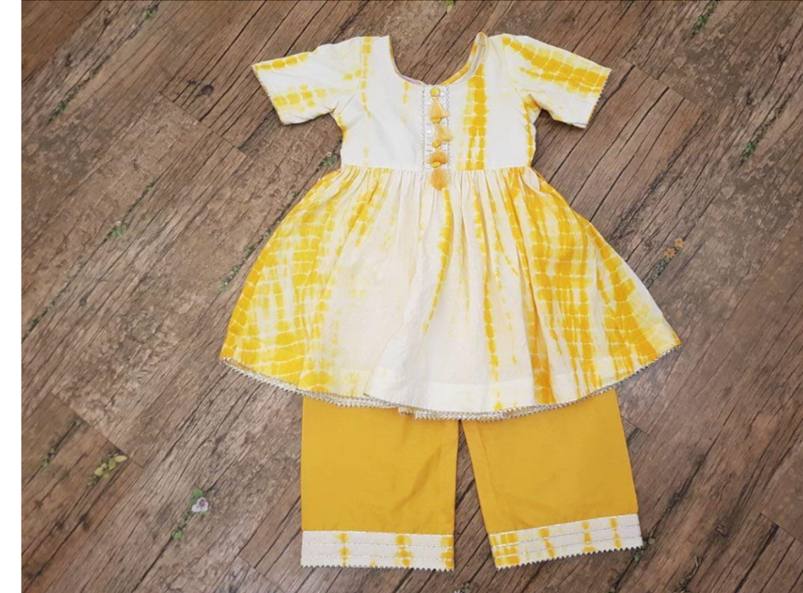 Bright and sunny yellow & white batik pleated tunic and pants set with cute tassels on the yoke