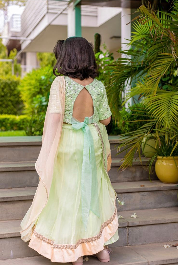 Enchanting mint lehenga with peach satin border & lace + blouse set
