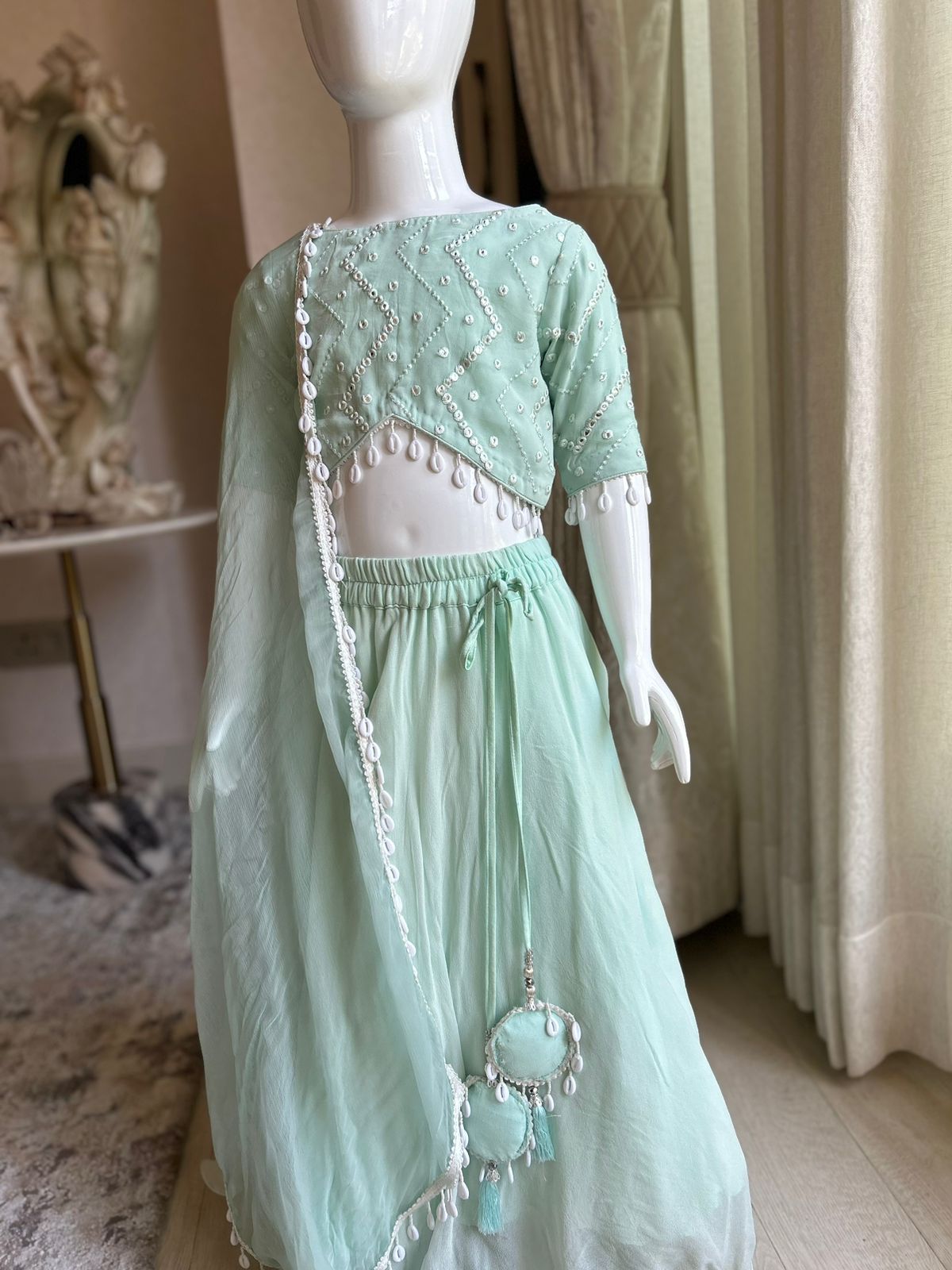 Cute seagreen mirror work lehenga set
