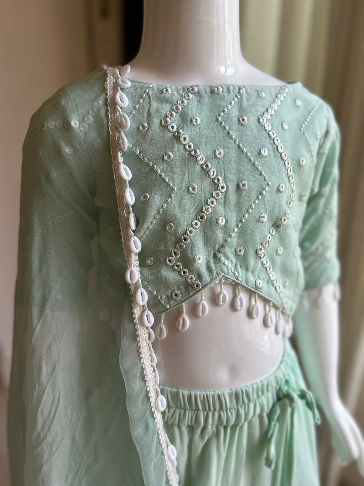 Cute seagreen mirror work lehenga set