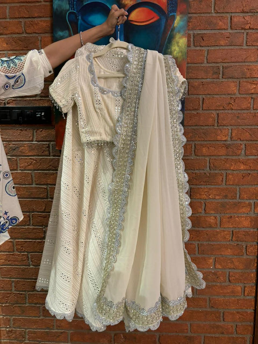 Fabulous off white mirror work lehenga set