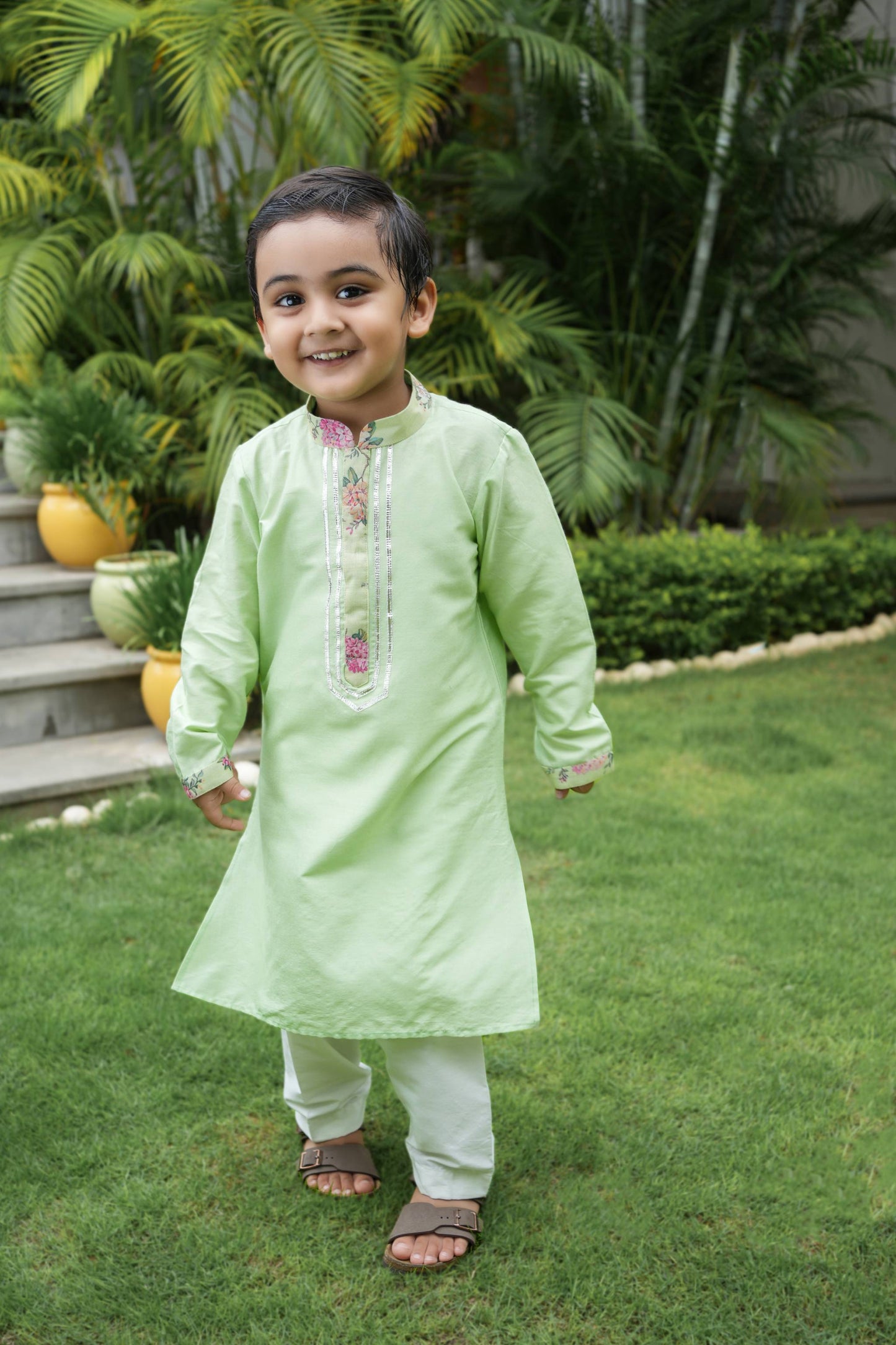 Adorable lime green kurta with floral collar and button patti adorned with gota line alongwith a white pants sets