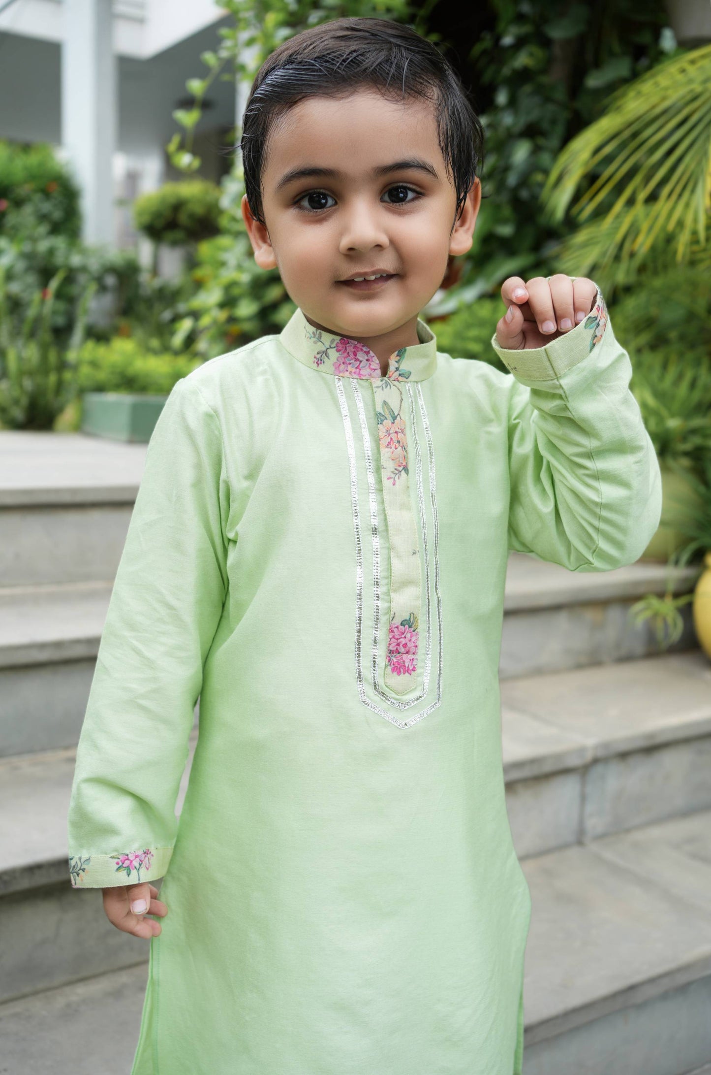 Adorable lime green kurta with floral collar and button patti adorned with gota line alongwith a white pants sets