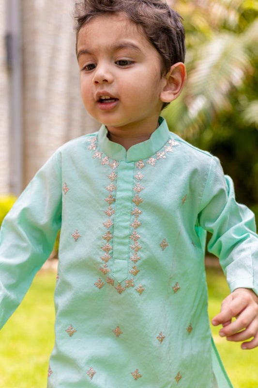 Gorgeous green pitten work kurta set