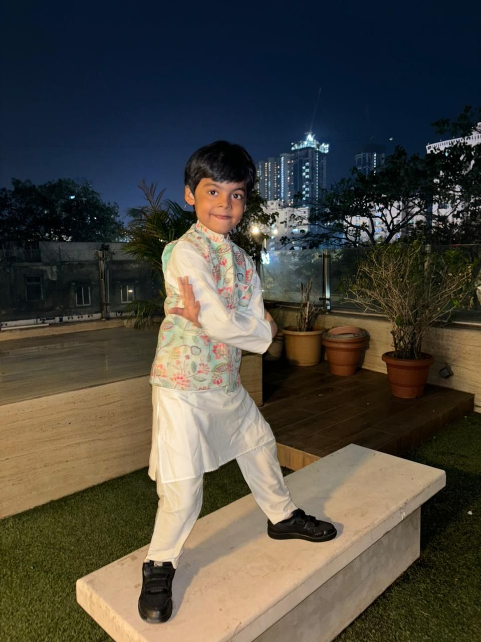 Royal white kurta with dori work and a gorgeous aqua floral jacket alongwith pants set