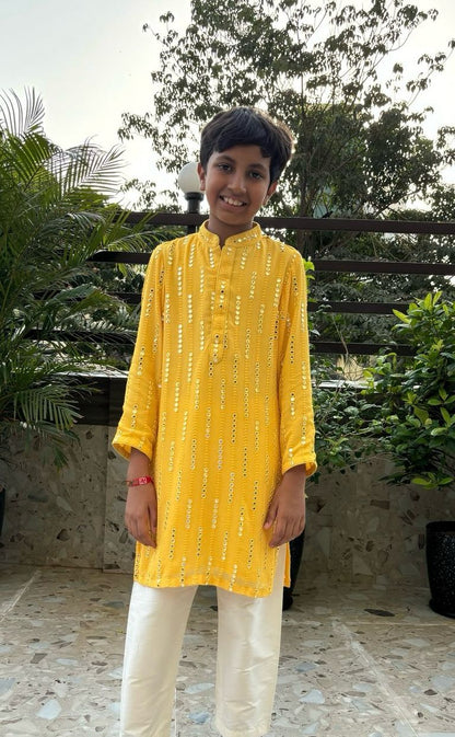 Beaming mango yellow mirror work kurta and white pyjama set